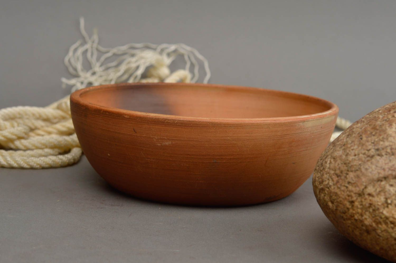 Handmade small ethnic smooth brown ceramic bowl for serving hot and cold dishes photo 1