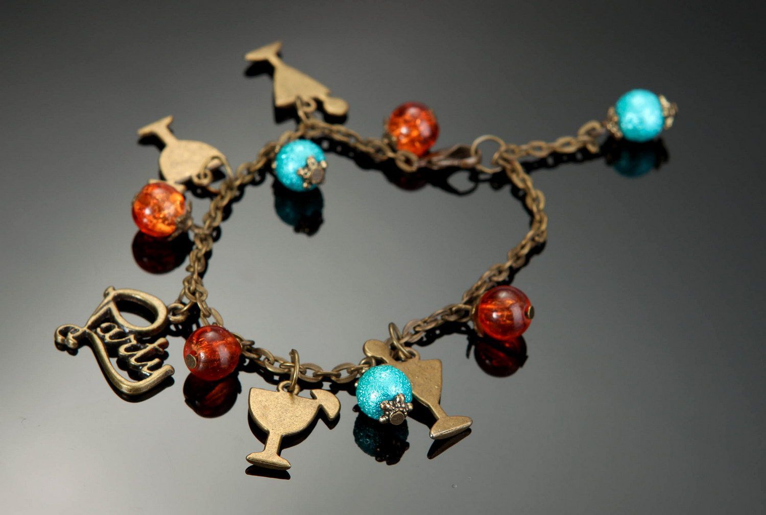 Bracelet fait main en verre et bronze avec perles céramiques photo 1