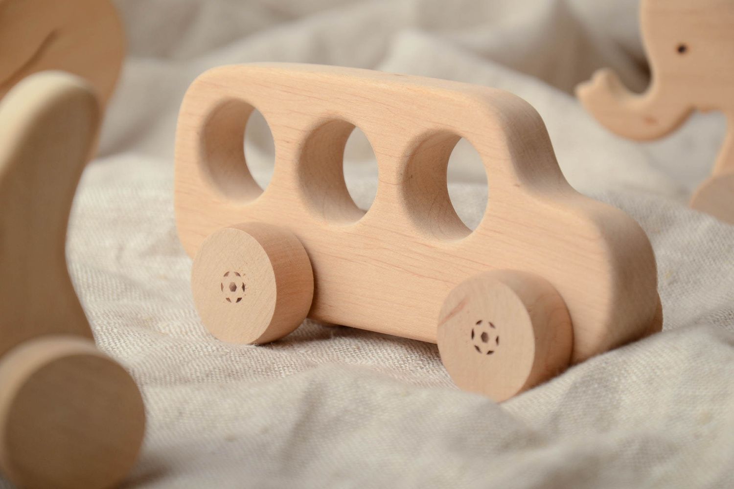 Wooden wheeled toy photo 1