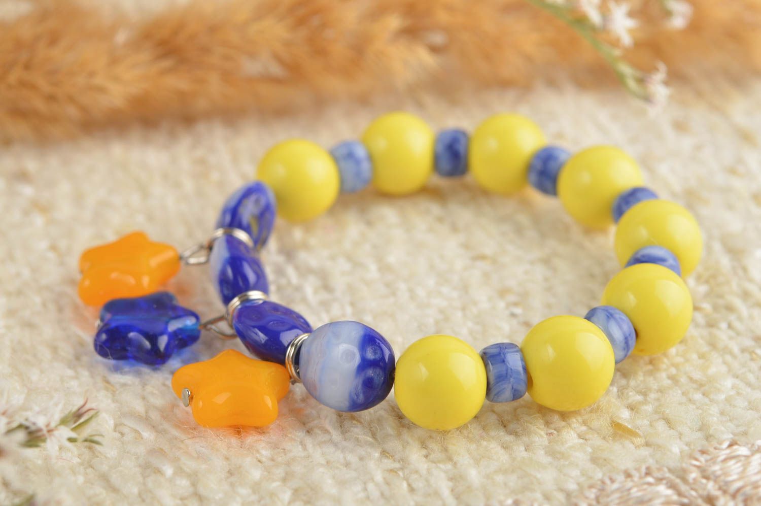 Yellow and blue beads bracelet on elastic cord cute with orange charms for girls  photo 1