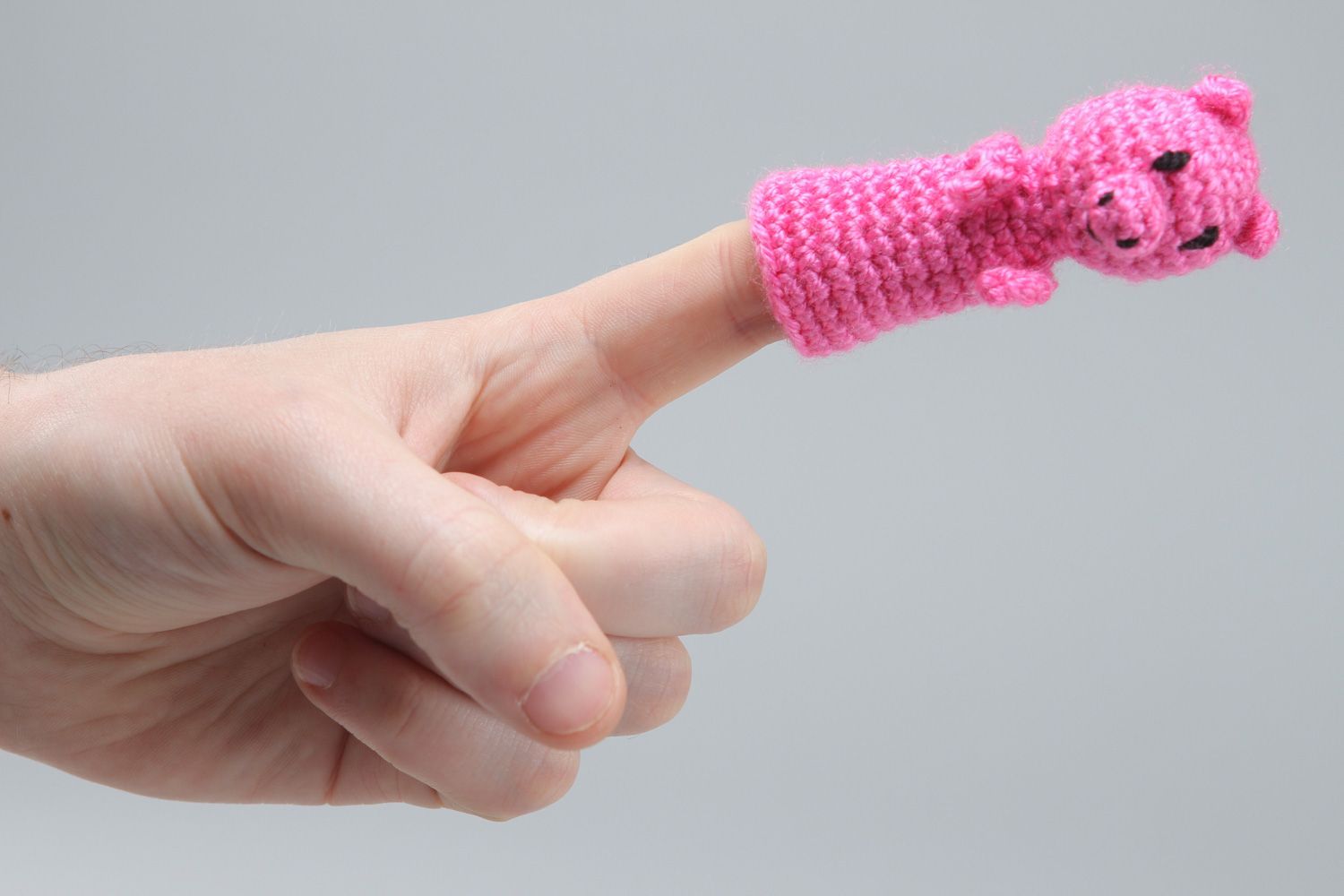 Handmade finger puppet in the shape of pink pig crocheted of acrylic threads photo 4