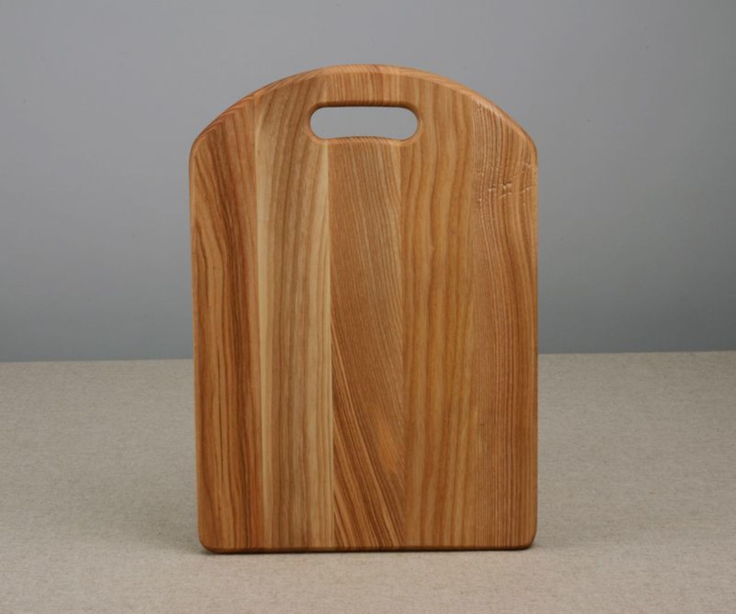 A wooden cutting board photo 4