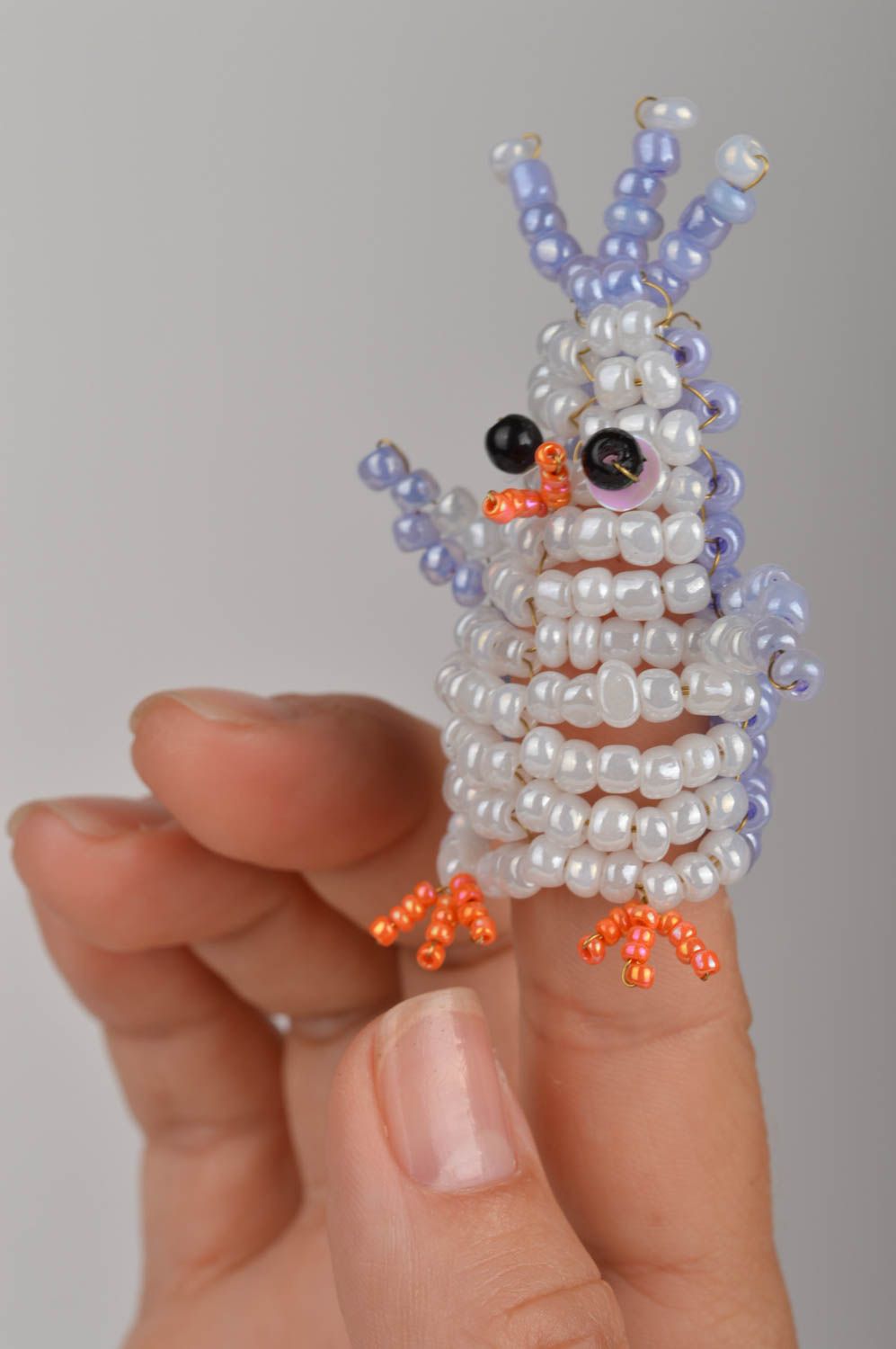 Unusual funny designer small handmade finger toy penguin made of beads photo 1