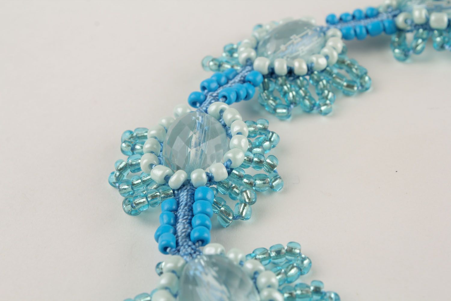 Blue macrame necklace made using the techniques of macrame and ankars photo 5