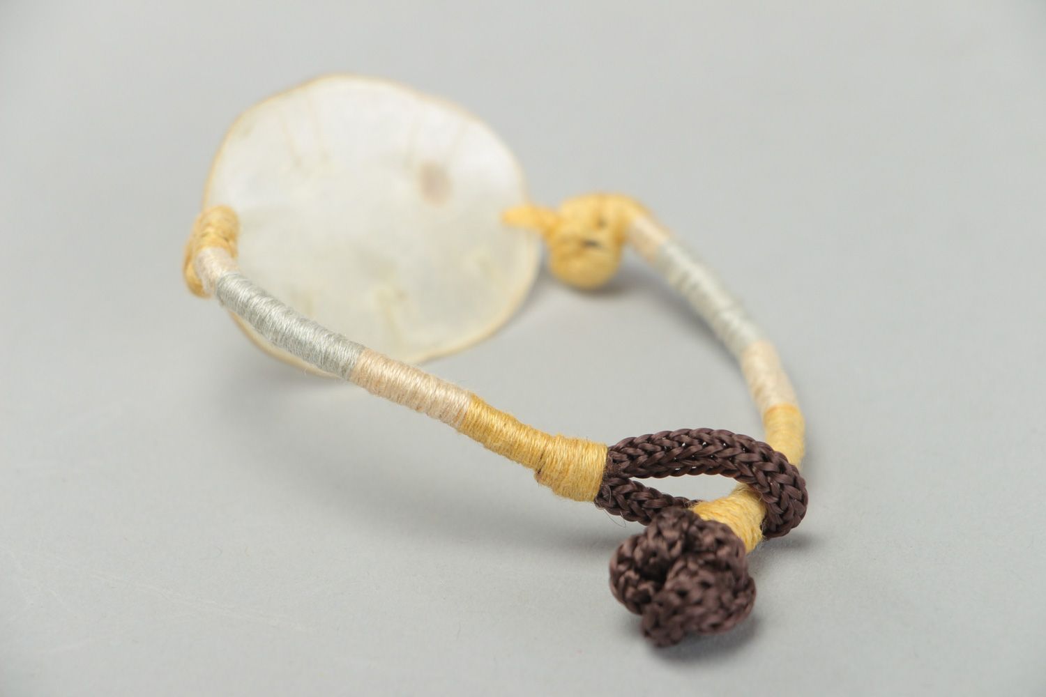 Handmade friendship bracelet with dried flowers coated with epoxy Lunaria photo 3