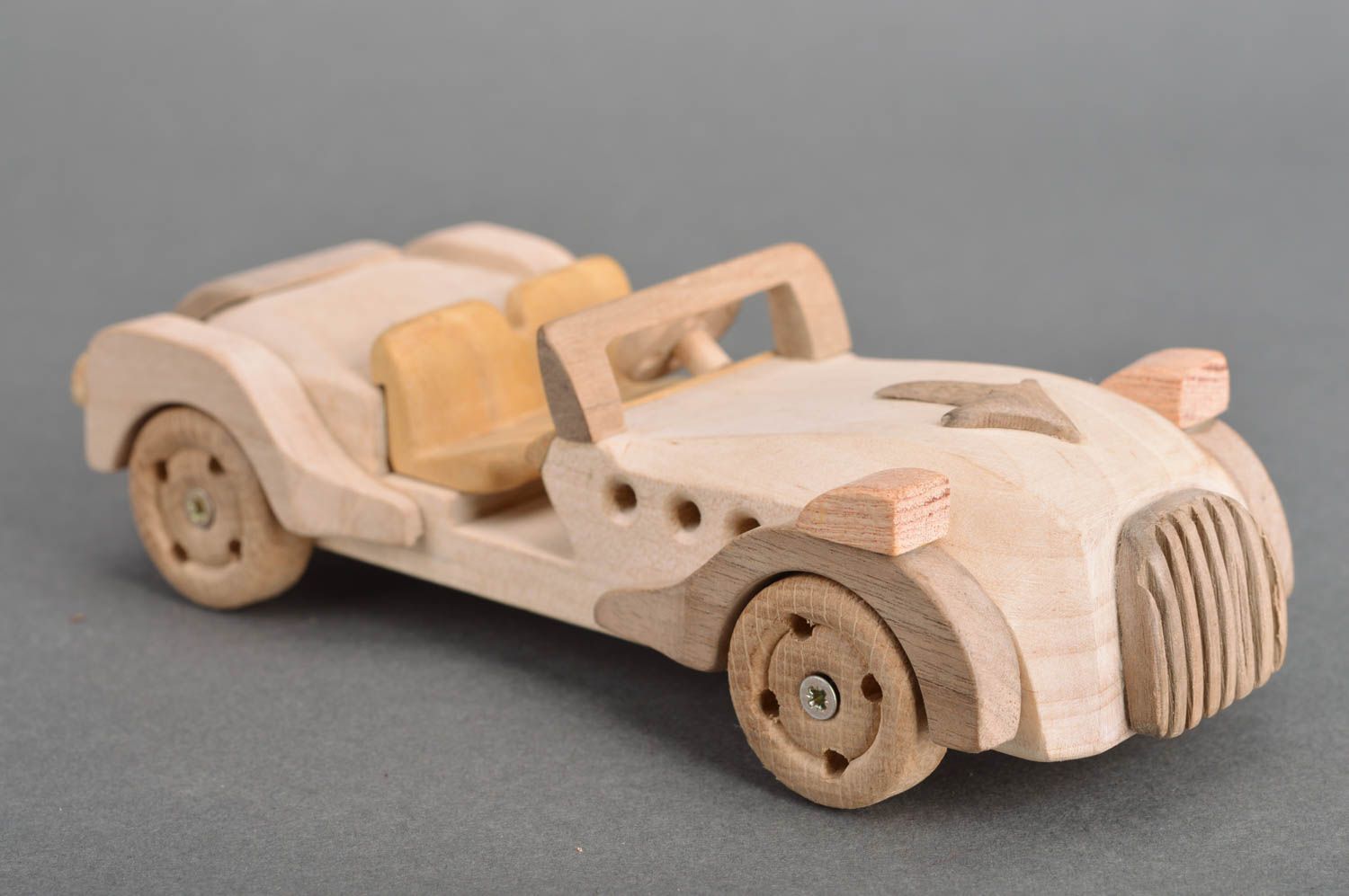Beautiful light handcrafted children's wooden toy car cabriolet  photo 2
