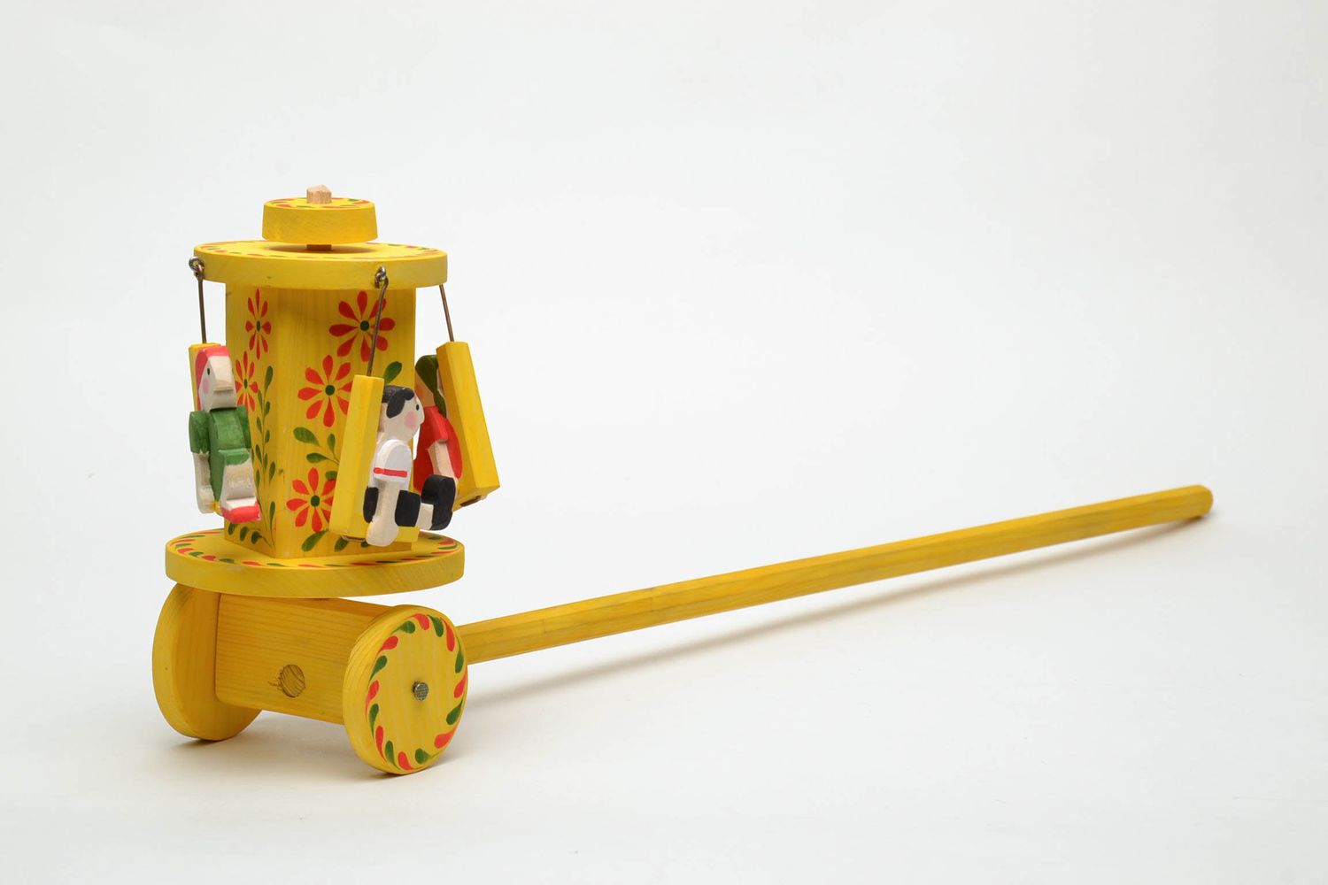 Wooden wheeled toy with Ukrainian ethnic painting photo 2