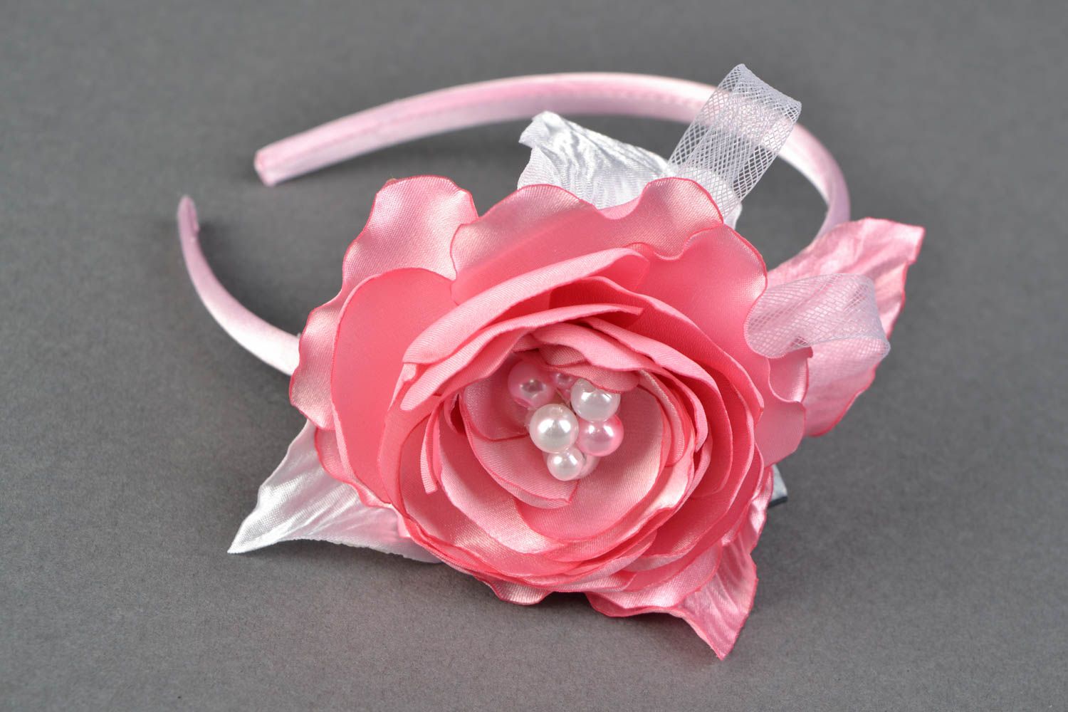 Bright pink headband with large flower photo 2