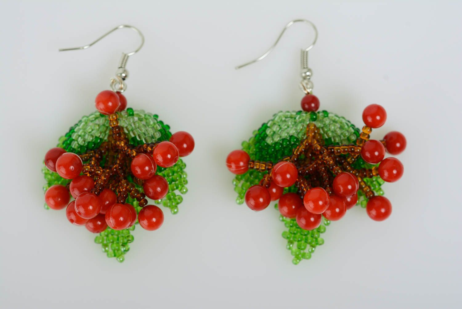 Red and green handmade woven beaded earrings with coral charms stylish photo 1