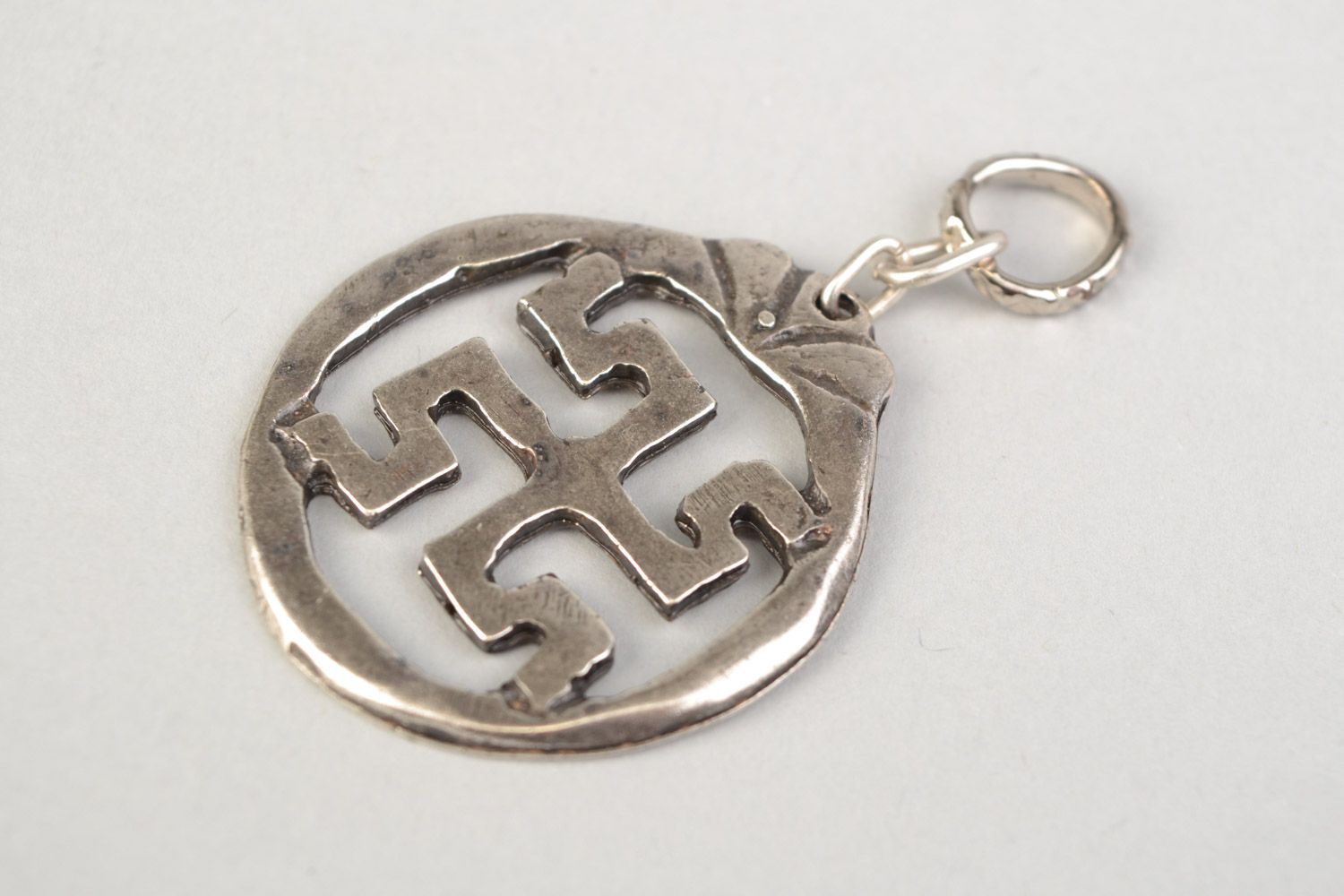 Handmade designer round metal pendant with Slavic symbol in ethnic style  photo 4