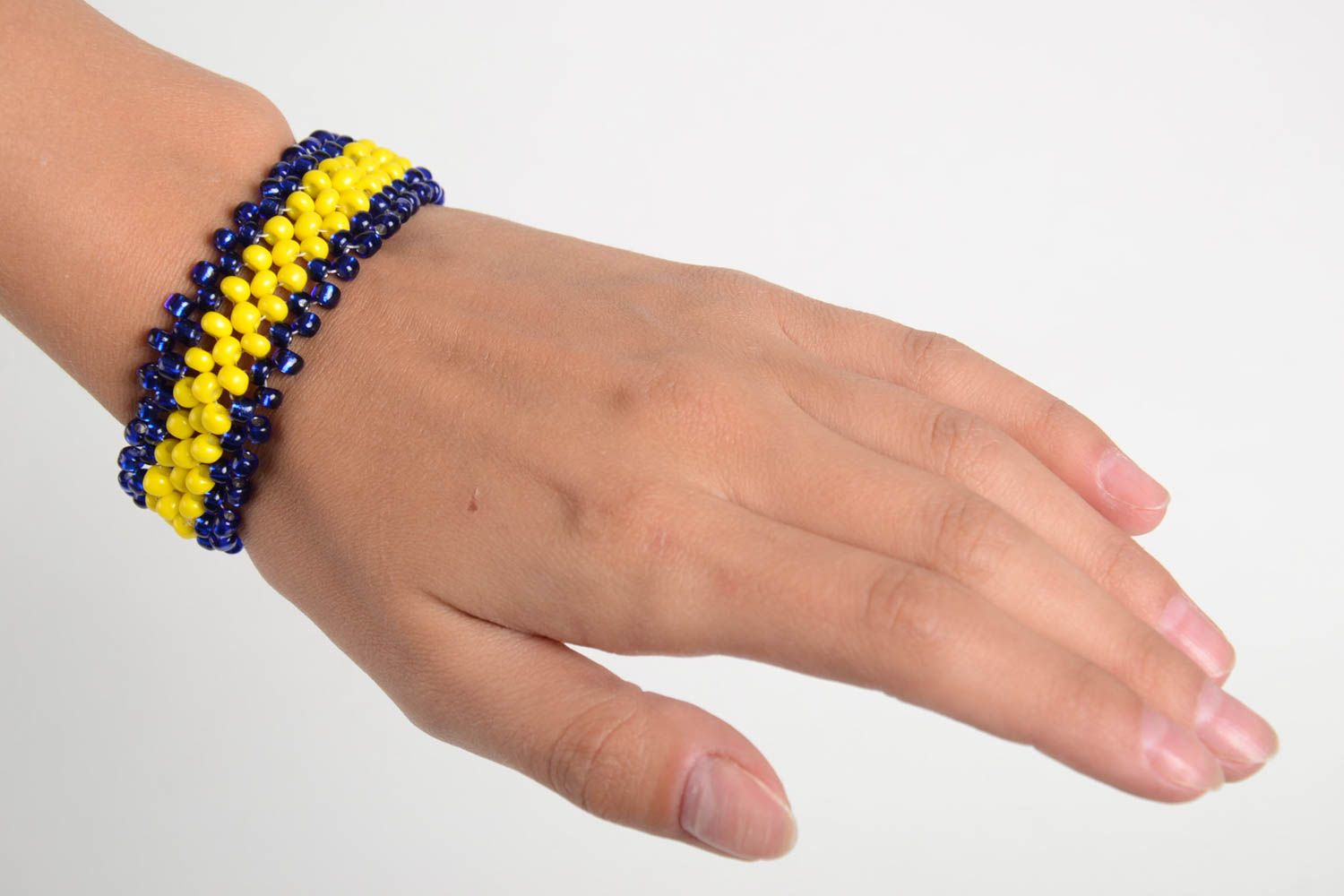 Dark blue and yellow beads line bracelet for girls photo 2