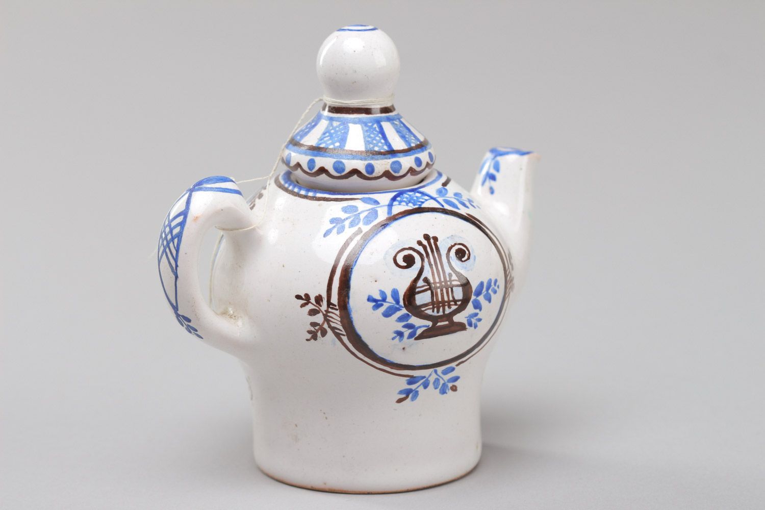 Керамический декоративный чайник с крышкой ручной работы покрытый эмалью фото 3