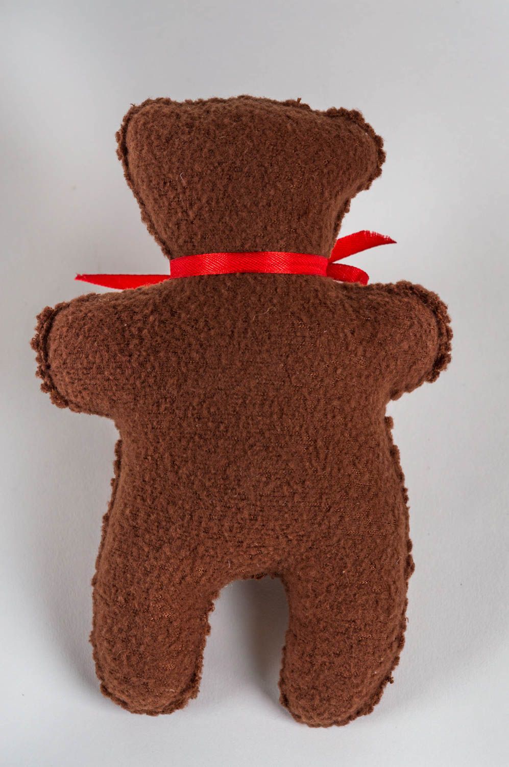 Игрушка мягкая медвежонок из флиса коричневый с бантом на шее ручная работа фото 3