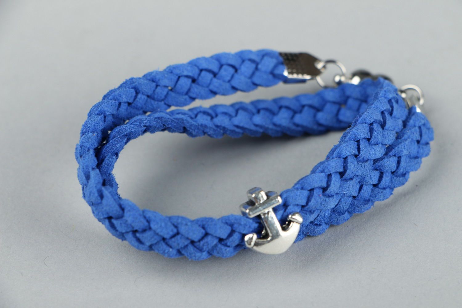 Leather bracelet with anchor pendant photo 1