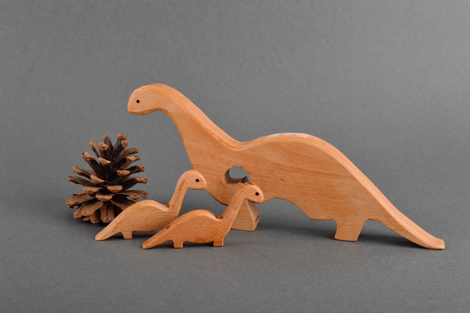 Handmade Spielzeug Holz Geschenk für Kinder Spielzeug aus Holz Dinofamilie foto 1