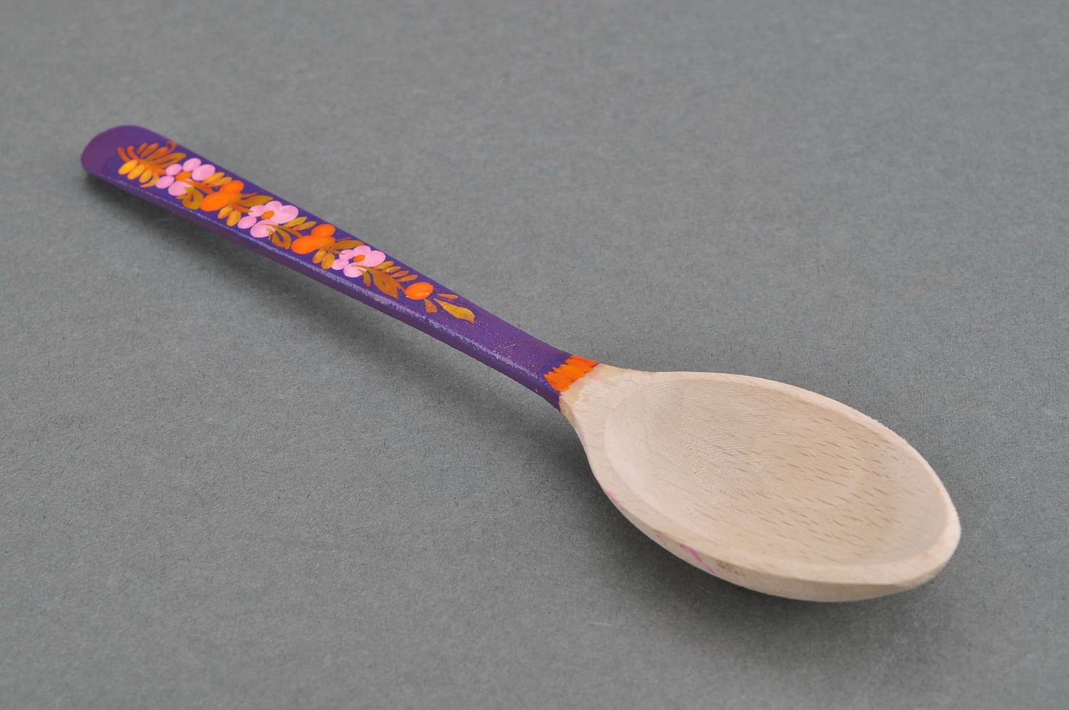 Wooden teaspoon with purple handle photo 1