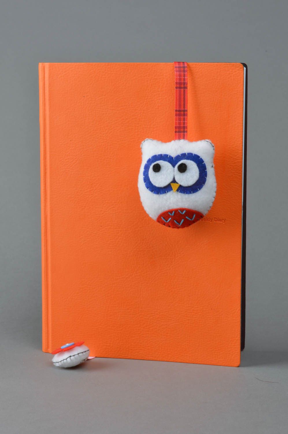 Unusual handmade designer white felt fabric soft bookmark in the shape of owl photo 1