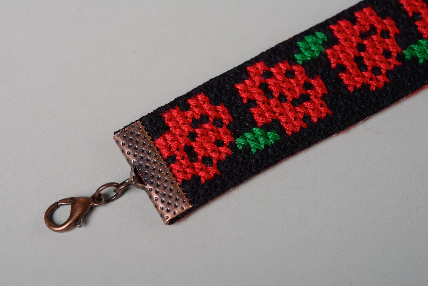 Black wrist bracelet with handmade contrast ethnic cross stitch embroidery for women photo 3