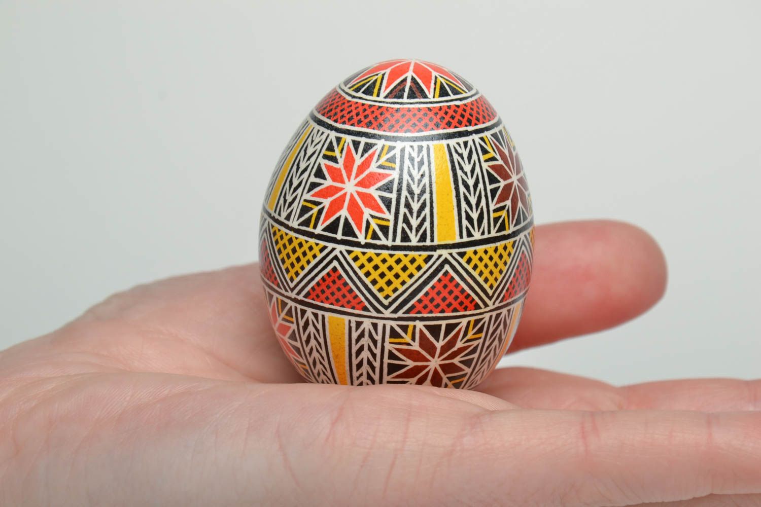 Decorative handmade Easter egg with ethnic painting photo 5