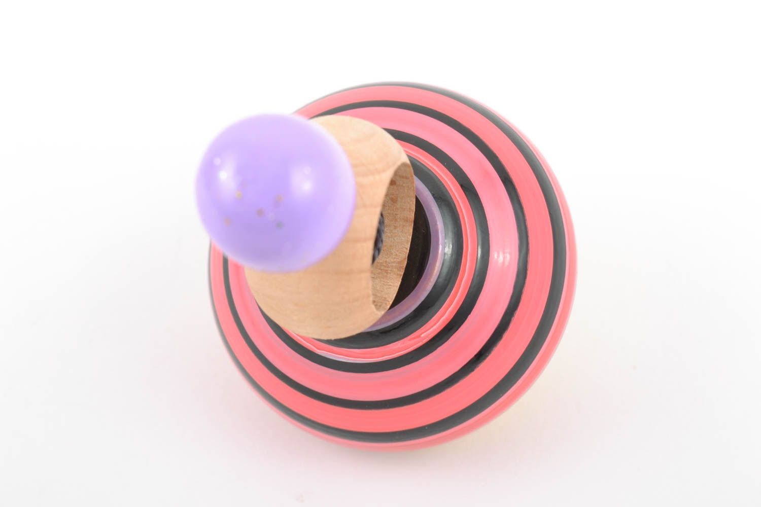 Bright small striped handmade wooden spinning top for children photo 3