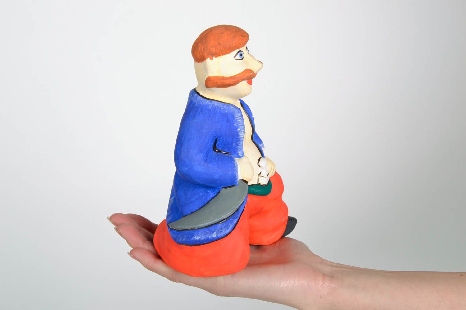 Figur aus Keramik Kosak mit Säbel  foto 2