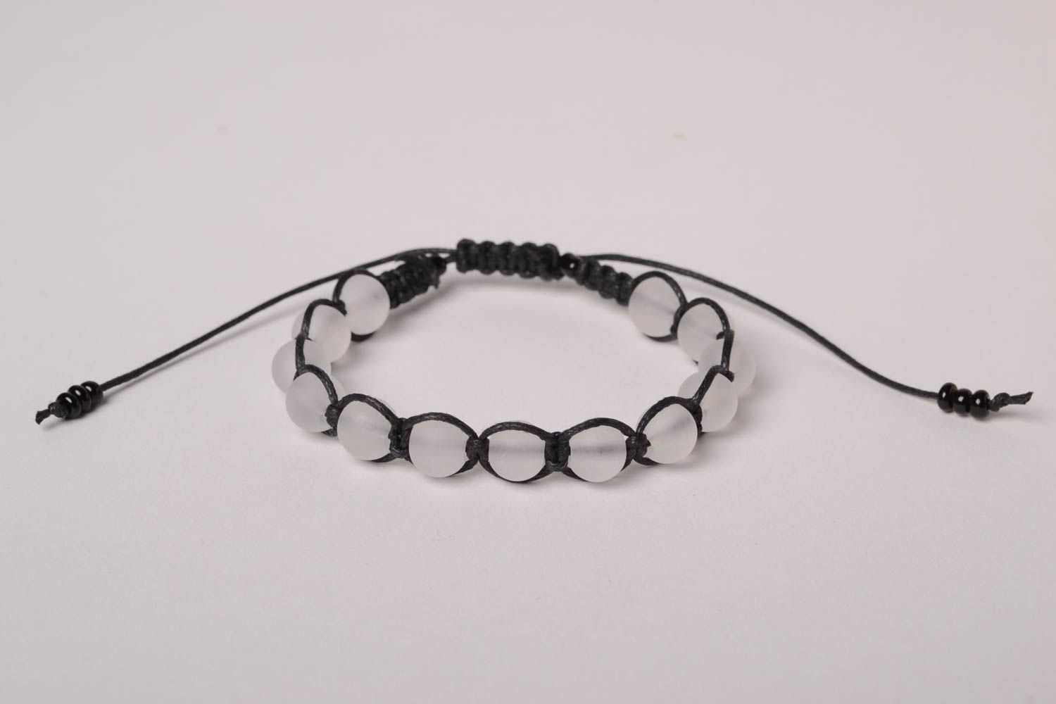 Transparent beads strand bracelet with black cord photo 3
