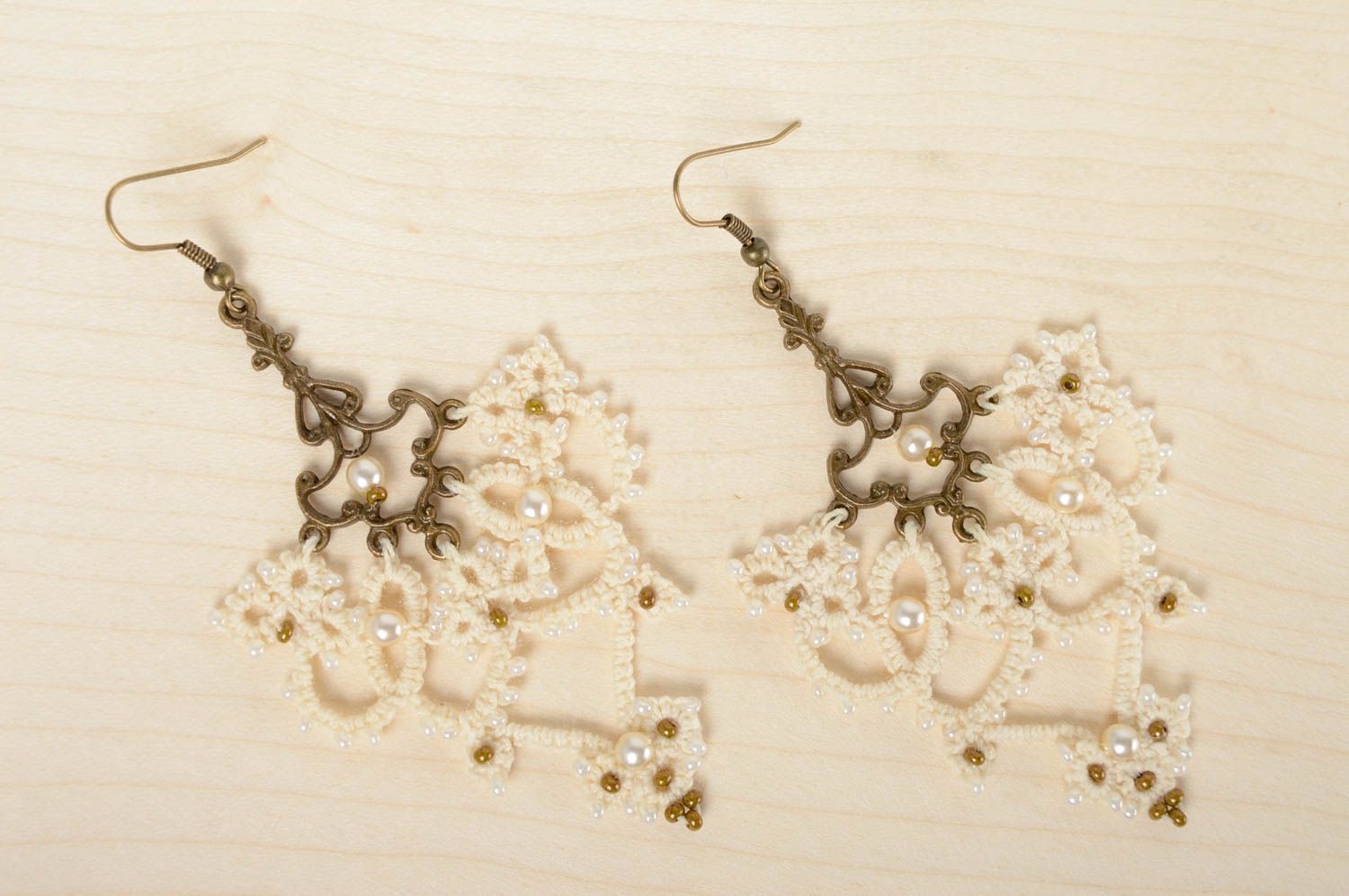 Textile earrings made using tatting and ankars techniques photo 1