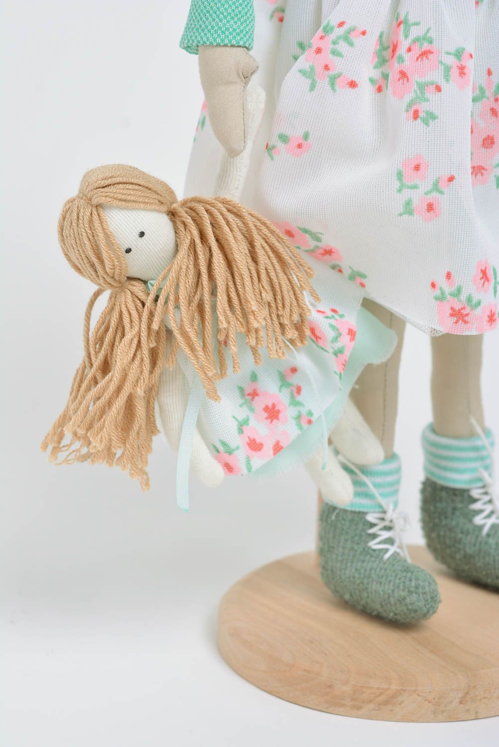 Handmade designer fabric soft doll girl in mint jacket with little soft toy photo 5