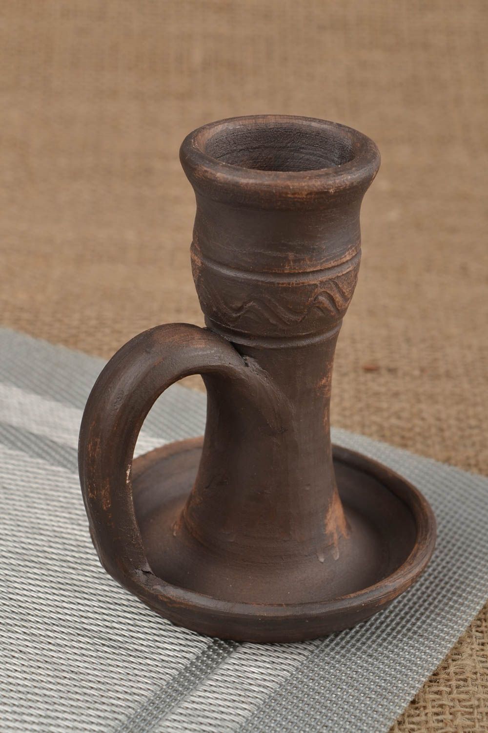 Handmade dark brown ethnic ceramic candlestick with handle polished  photo 1
