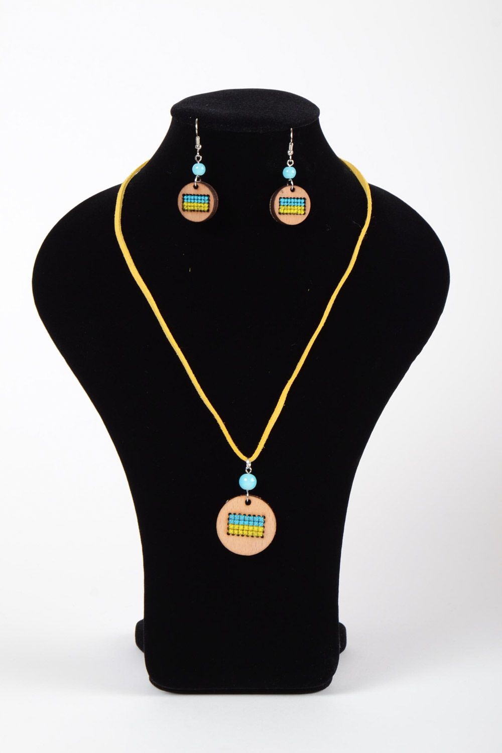Wooden handmade jewelry set of 2 pieces yellow with blue embroidery earrings and pendant photo 2