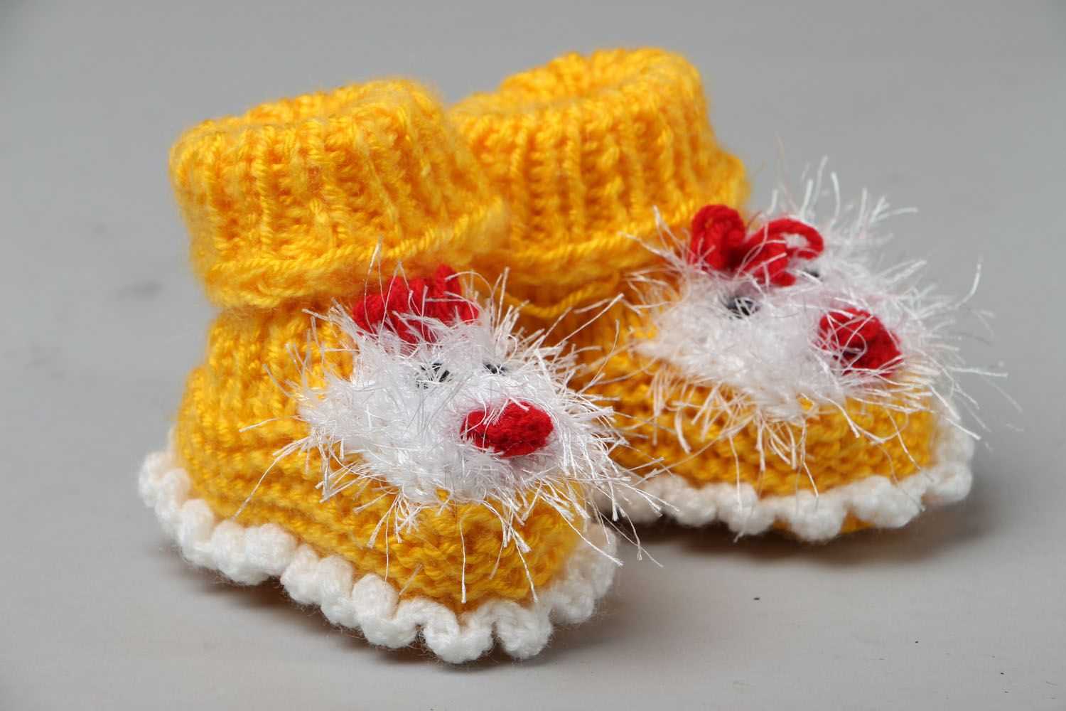 Homemade knitted baby booties Chicks photo 1