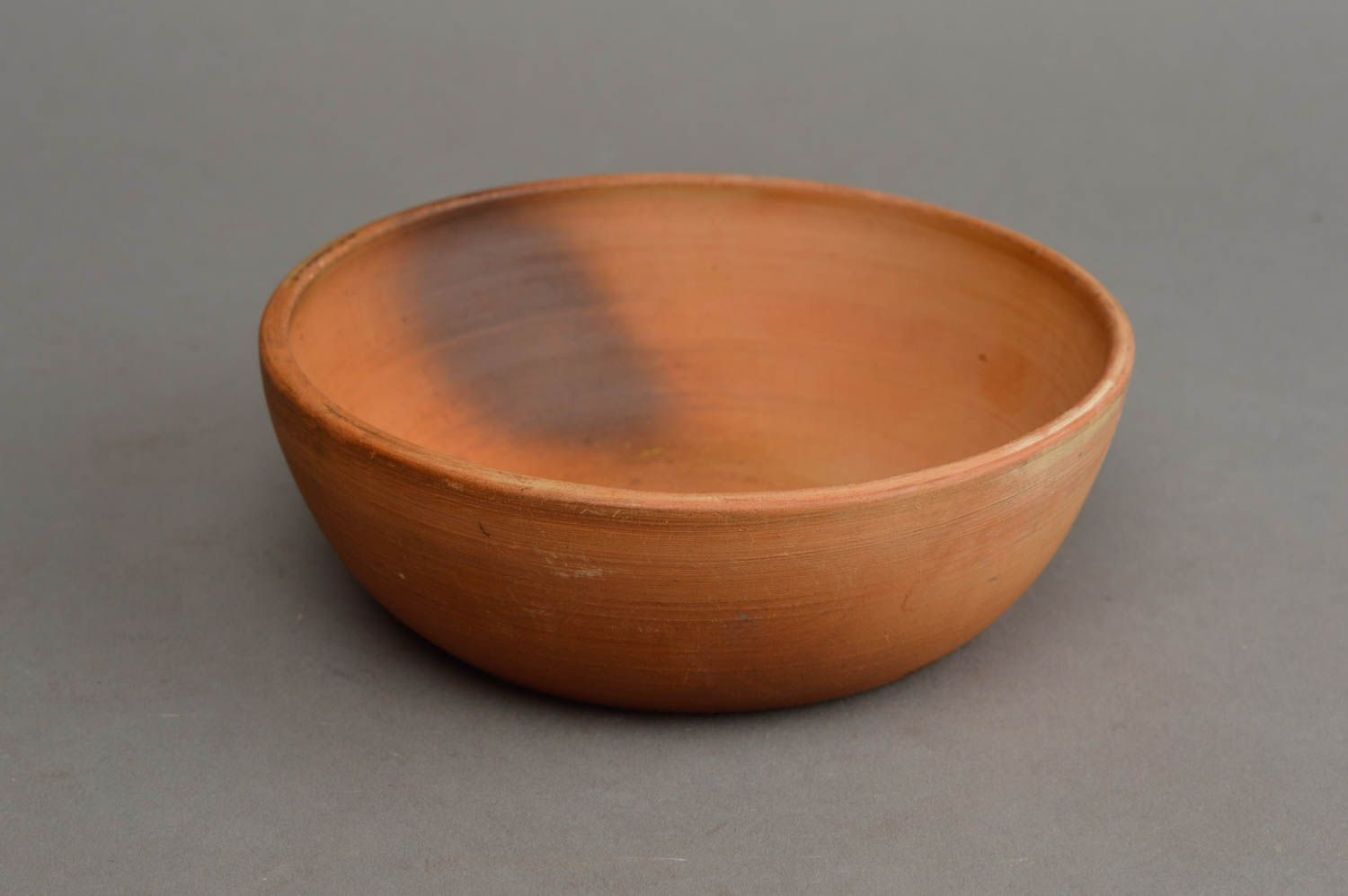 Handmade small ethnic smooth brown ceramic bowl for serving hot and cold dishes photo 2