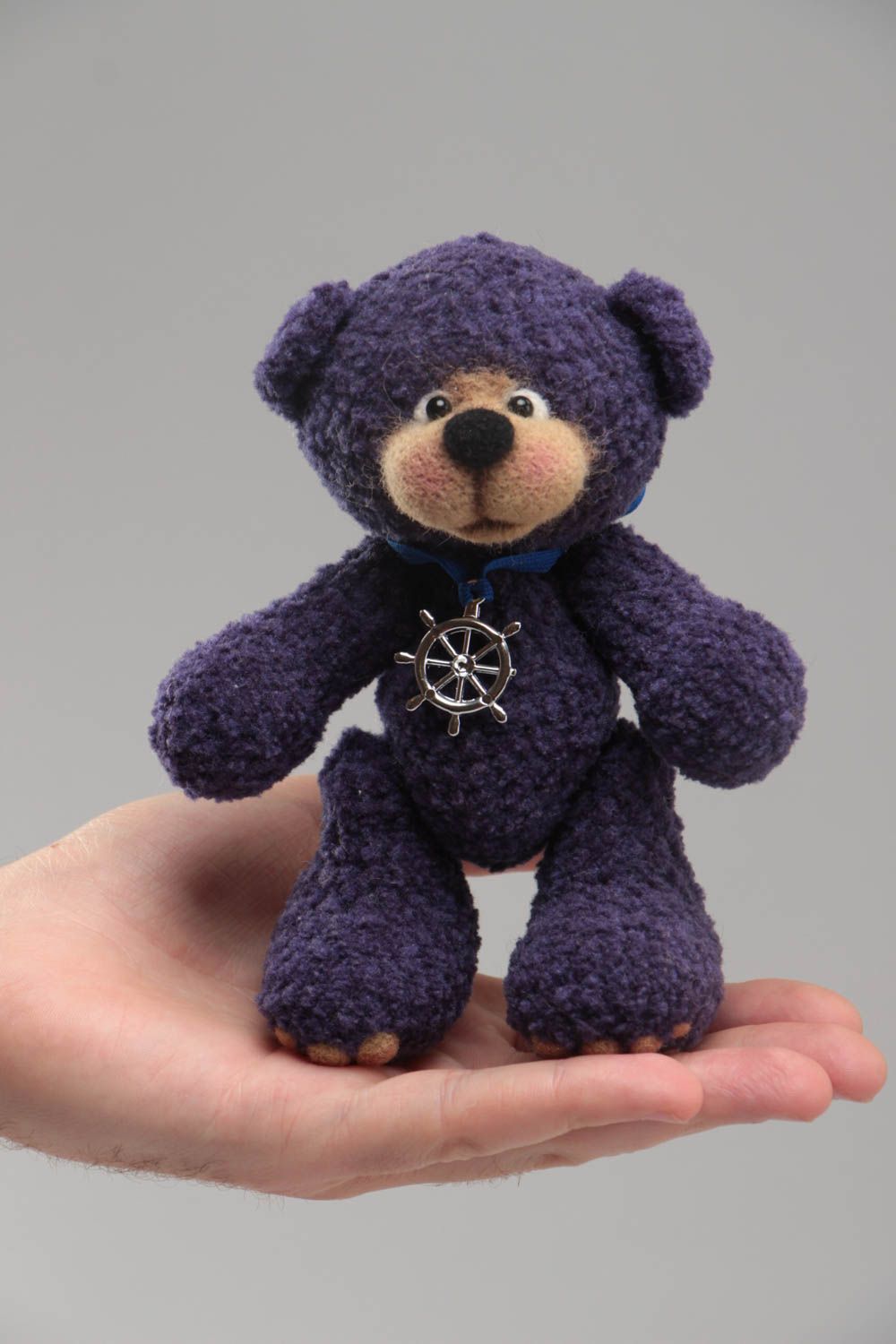 Handmade designer soft toy crocheted of woolen threads blue bear with charm photo 5