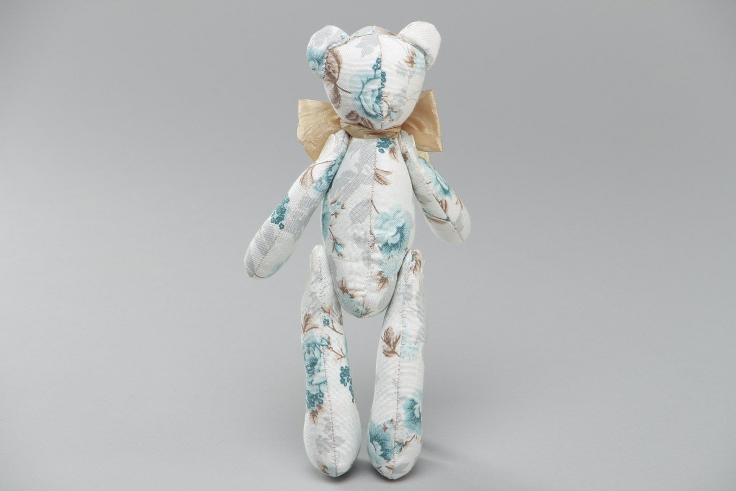 Handmade cute soft toy sewn of cotton Bear with bow in tender color palette photo 4