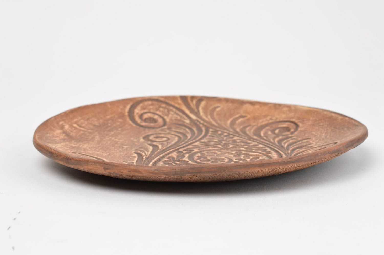 Plato de barro con dibujo artesanal decoración de mesa utensilios de cocina foto 3