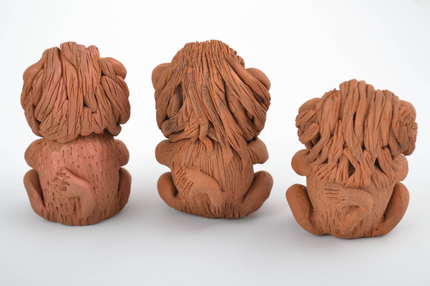 Figurine degli animali fatti a mano in ceramica set di tre cuccioli di leone foto 2