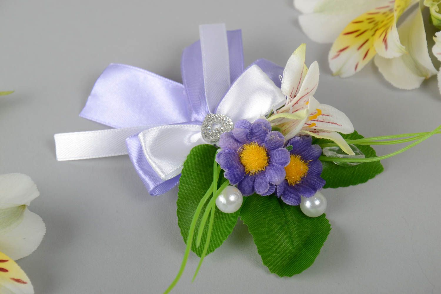 Handmade boutonniere for groom beautiful with flowers and satin on pin photo 1