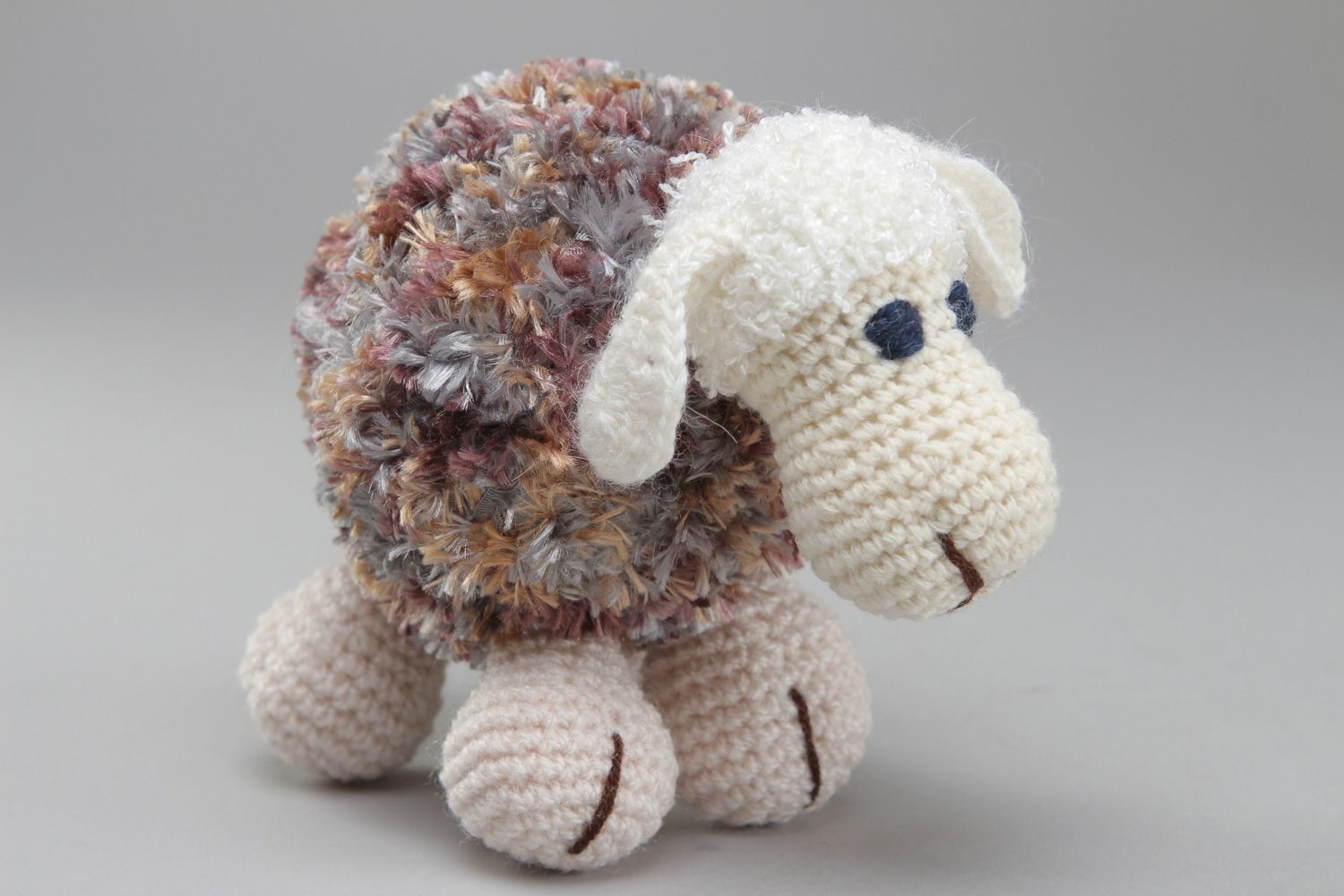 Small cute handmade soft toy crocheted of woolen and fluffy threads Lamb photo 1
