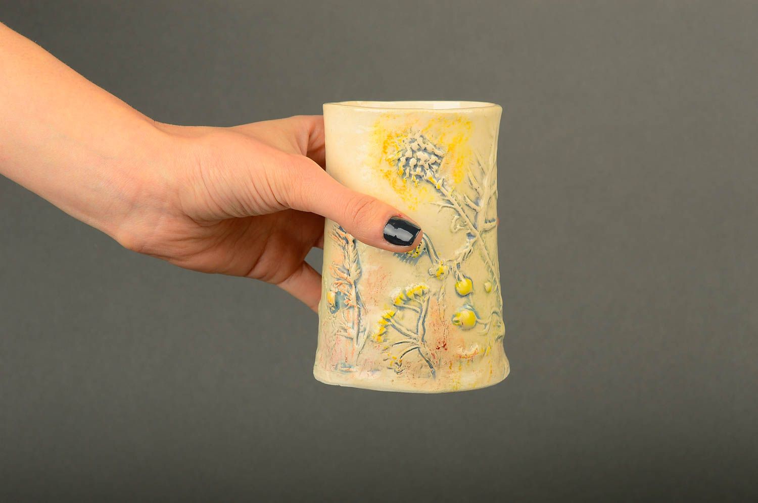 Ceramic glazed yellow color drinking cup with no handle and field flowers pattern photo 2