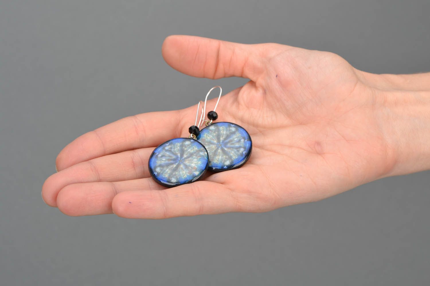 Earrings with author's image photo 2