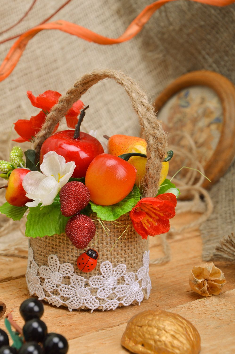 Handmade woven sisal basket with artificial fruit and flowers composition for home decor photo 1