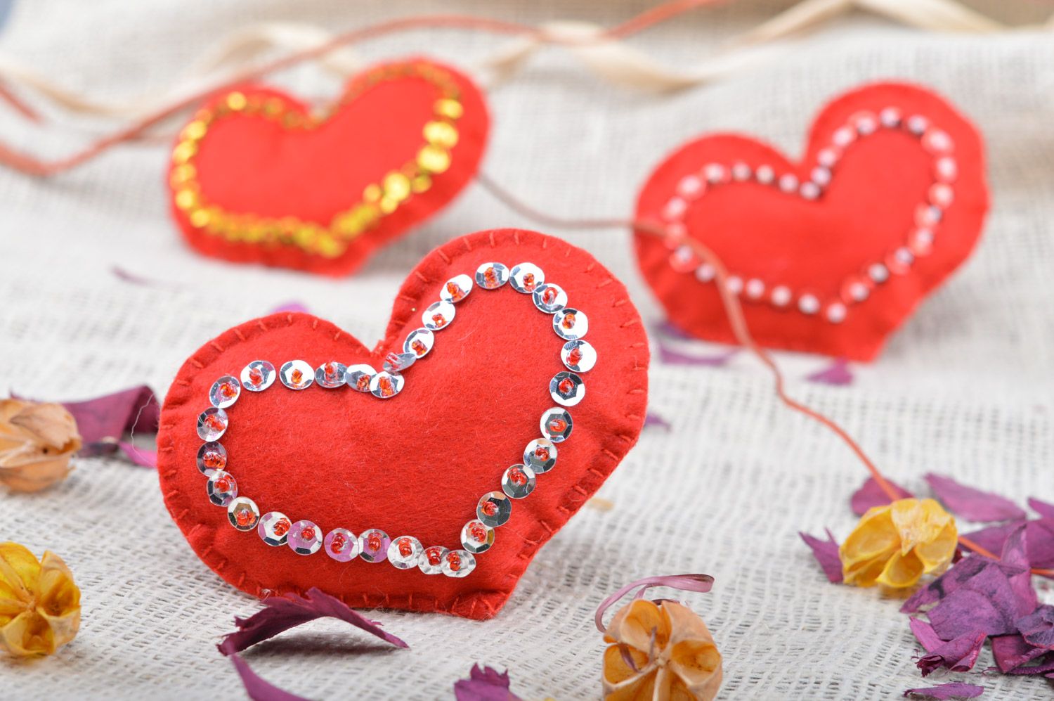 Handmade decorative red soft felt heart with paillettes for interior photo 4