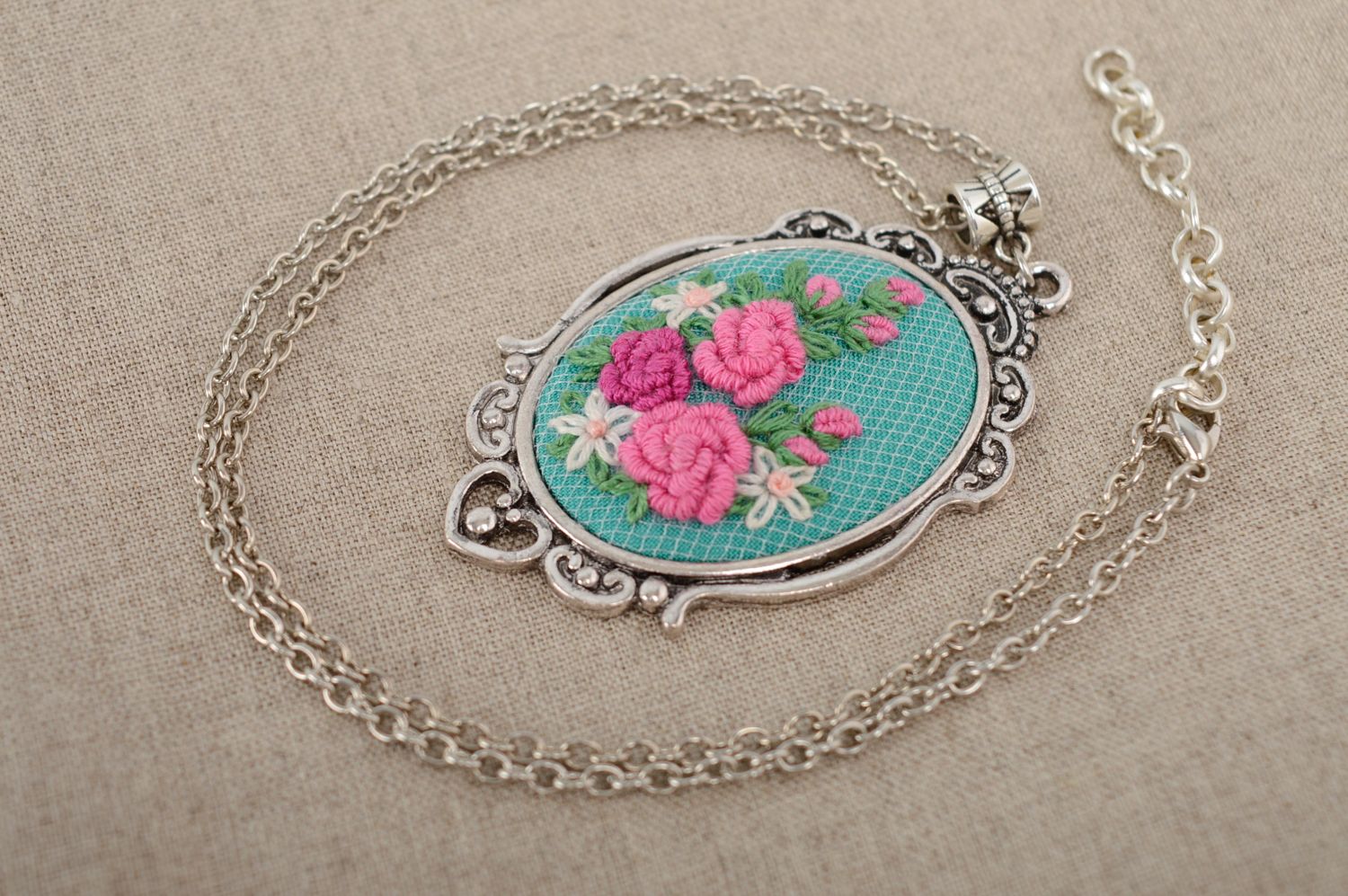 Hand embroidered pendant with metal chain photo 1