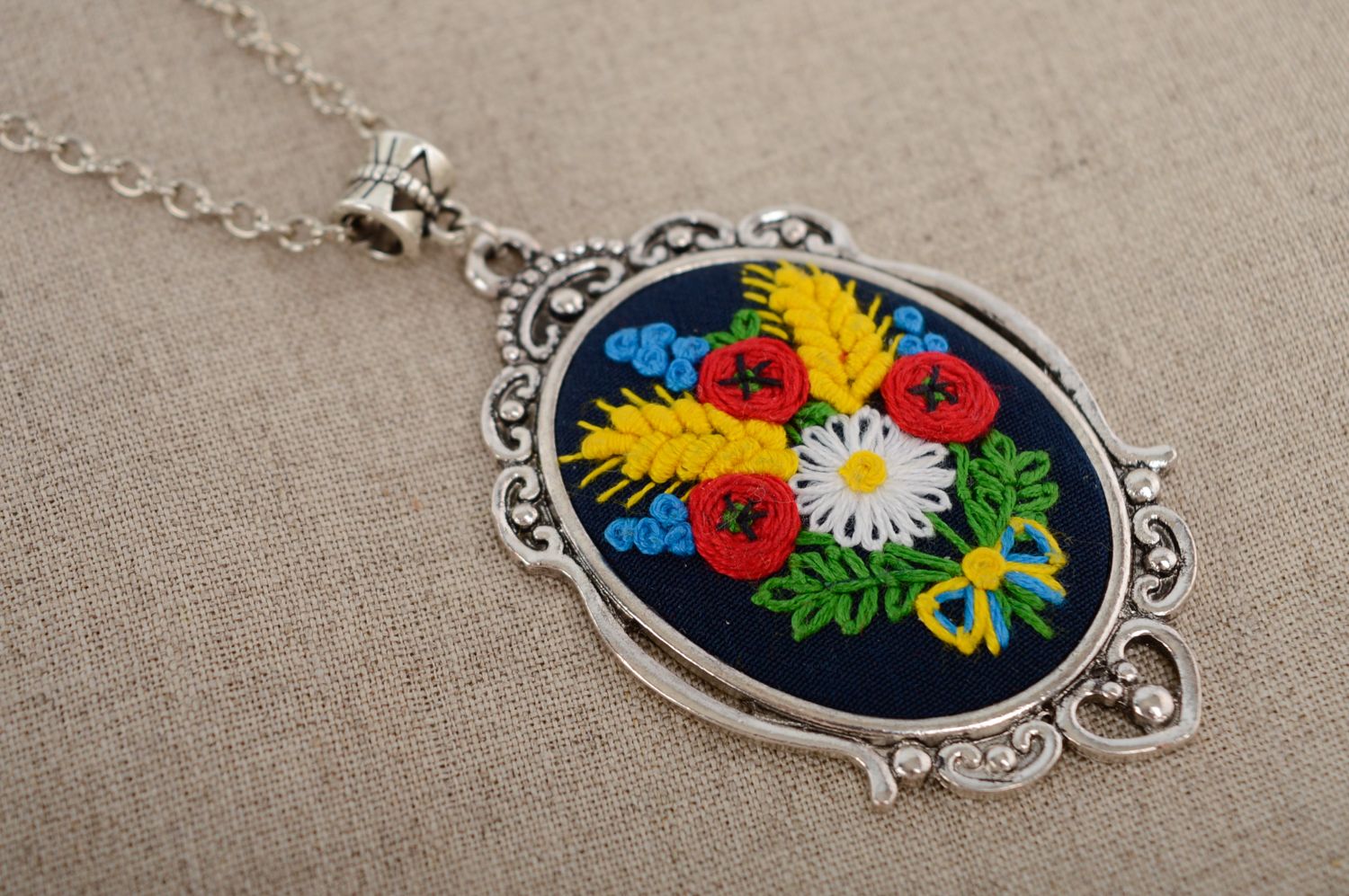 Pendant with French knot embroidery on long chain photo 4