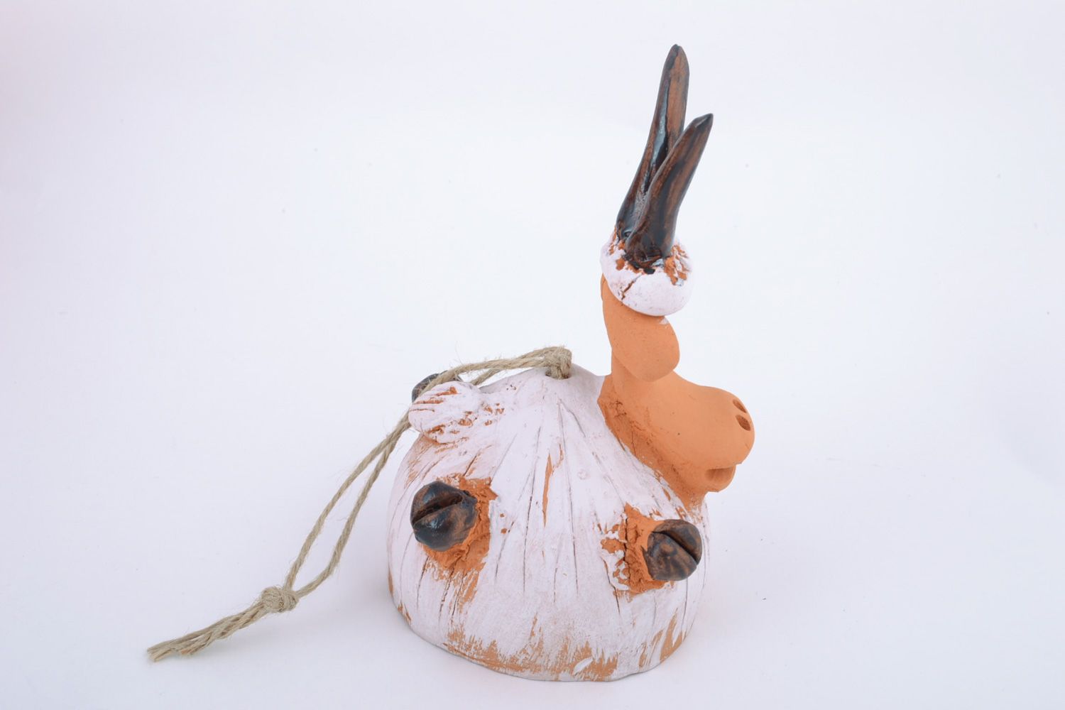Handmade traditional painted ceramic bell coated with glaze in the shape of goat photo 2