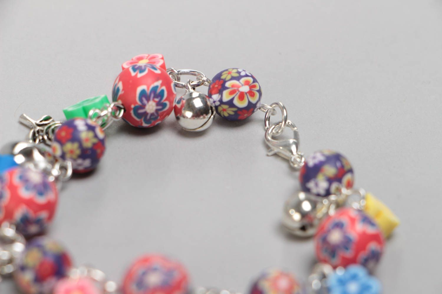 Bright handmade children's polymer clay wrist bracelet with beads and charms photo 4