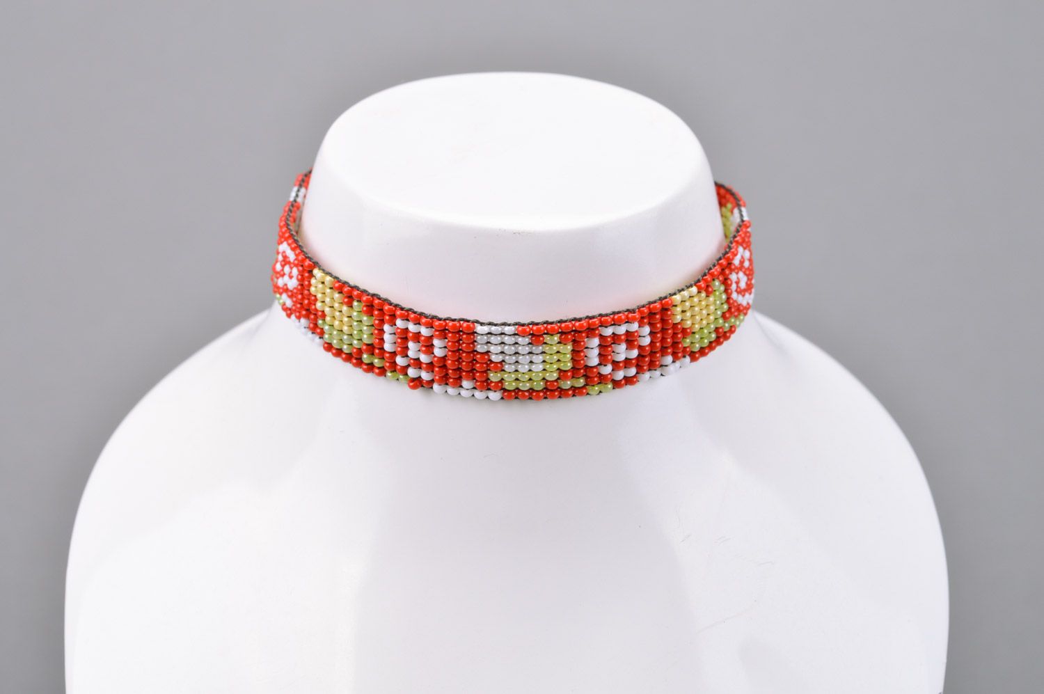 Handmade red bead woven necklace with ties and floral ornaments for women photo 1