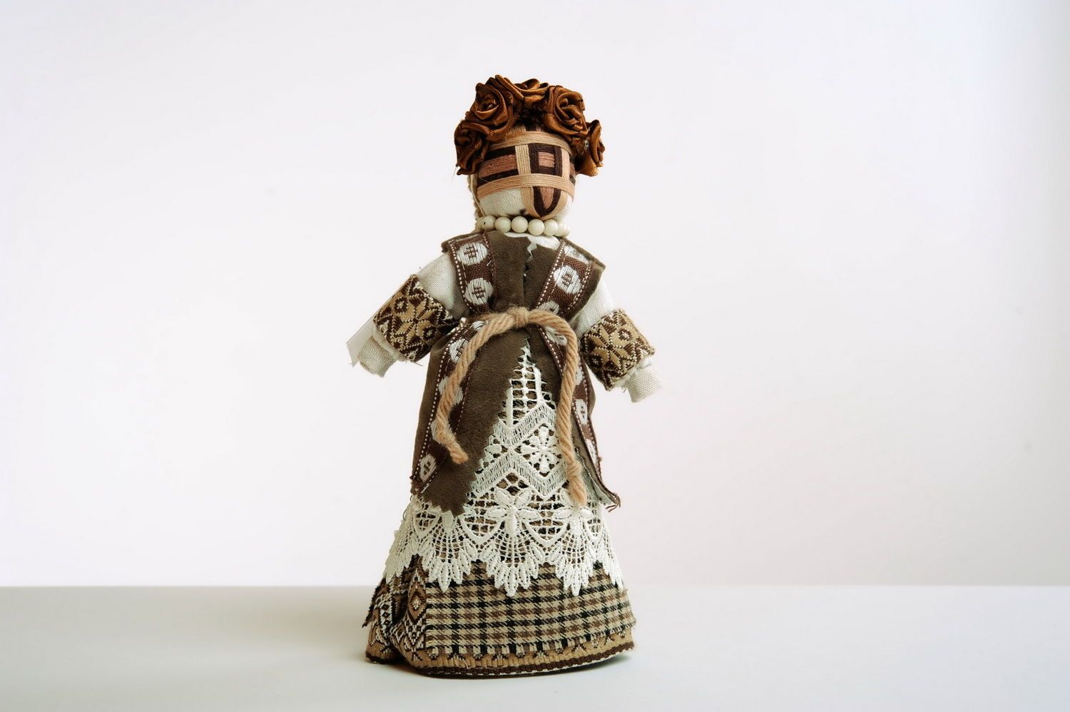 Brown fabric doll photo 1