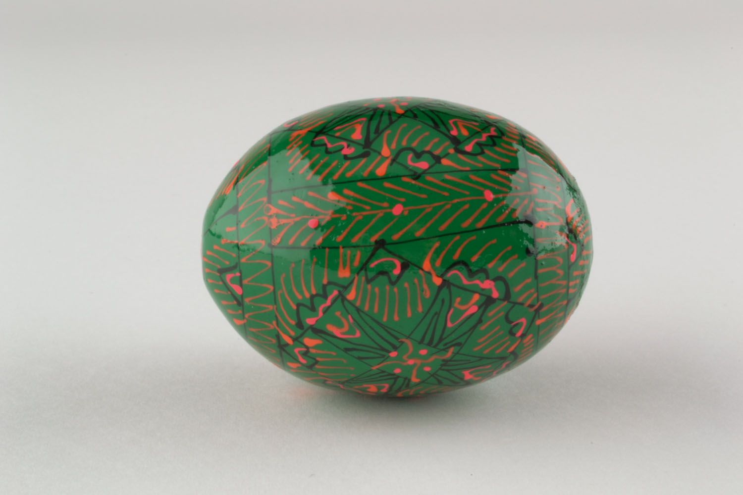 Wooden egg with ornaments photo 2