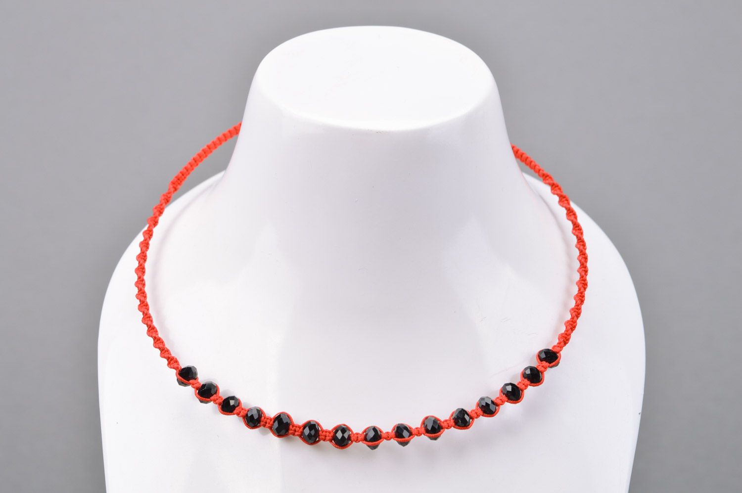 Handmade necklace woven of red threads and black beads on wire frame for women photo 1